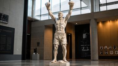 Statues of men Boxer with raised hands wearing gloves 3d model