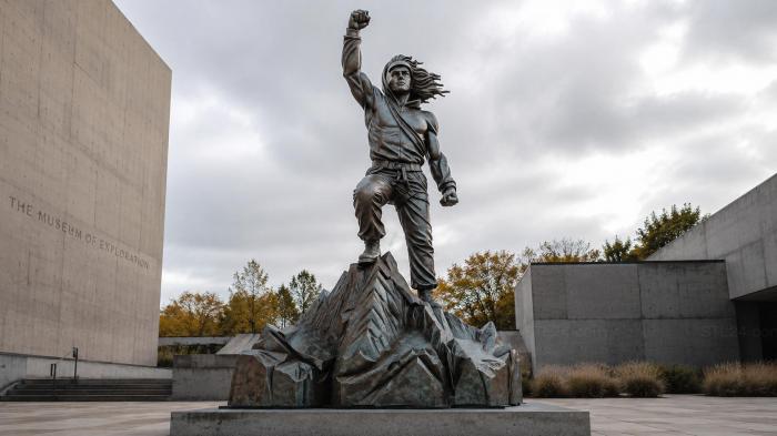 Man with raised fist on rock peak 3d STL model